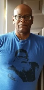 Fan activist Chris Barkley in blue t-shirt